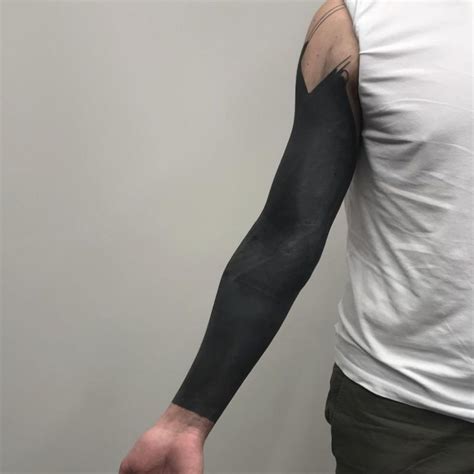 blacked out tattoo sleeve|full black sleeve tattoo meaning.